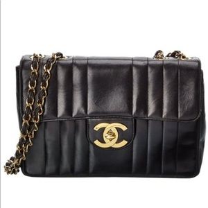 Vintage lamb skin Chanel vertical leather bag